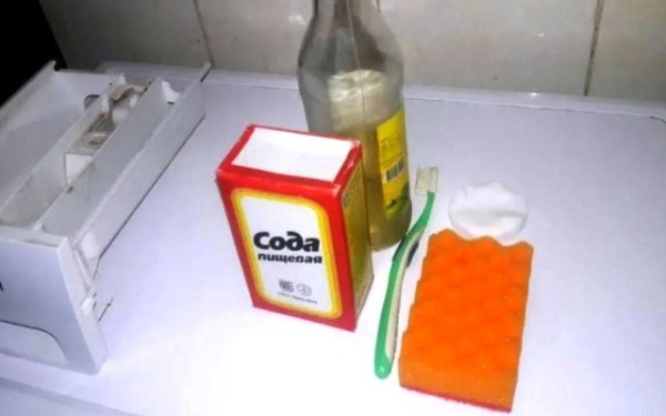 Для чего нужно чистить лоток стиральной машины и как правильно это делать